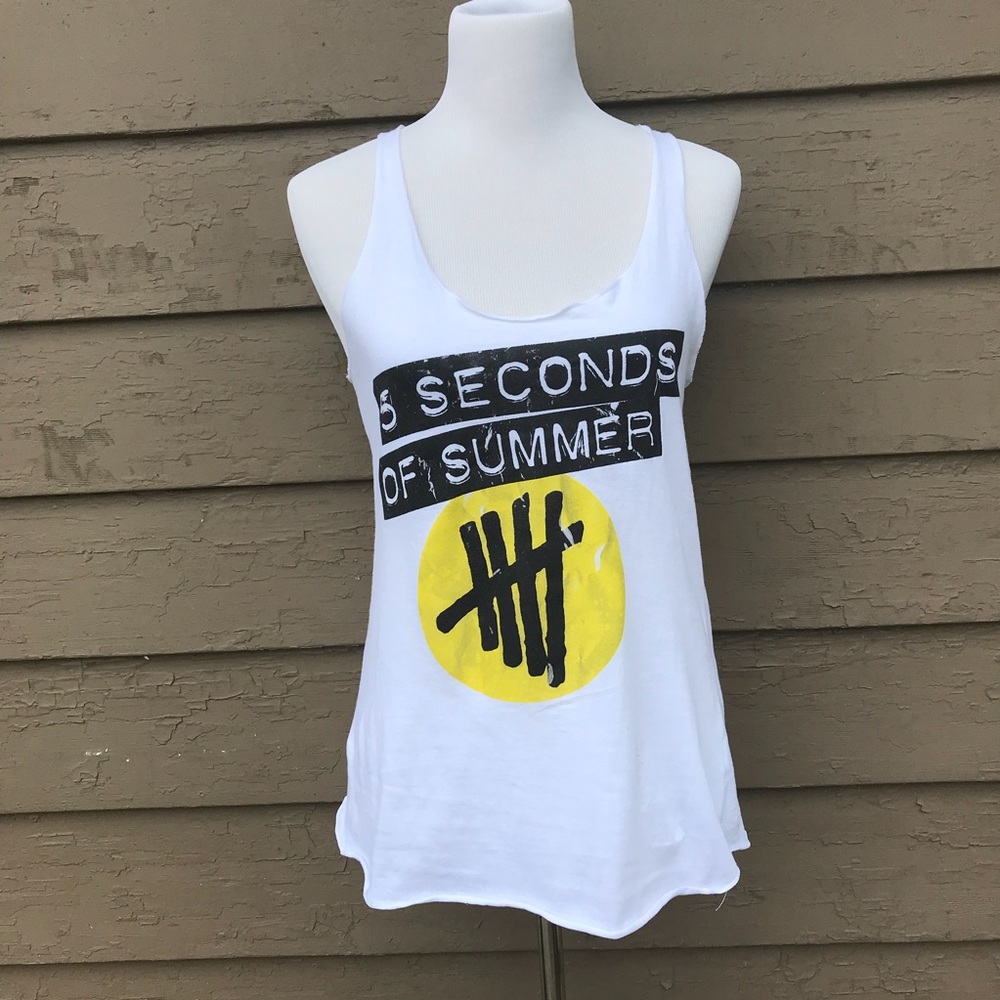 A white tank top  the band five seconds of summer